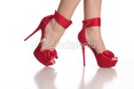 stock-photo-19627670-red-high-heels-shoes-with-a-bow-on-the-toe.jpg