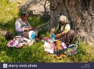 local-turkish-women-making-handcrafts-under-thousands-years-old-olive-CRWWTC.jpg